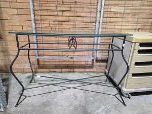 Wrought iron console table with bevelled glass top
