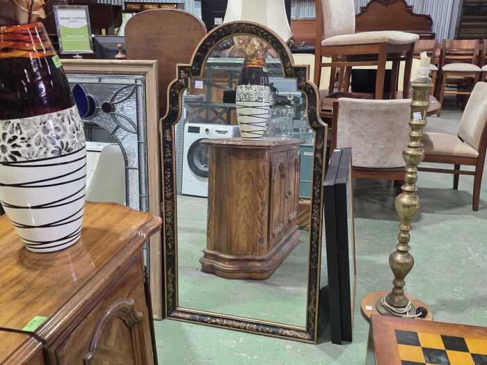 Keyhole-shaped timber wall mirror