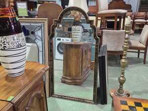 Keyhole-shaped timber wall mirror