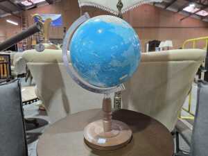 Atlas globe on turned timber base