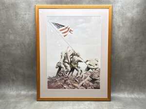 After Joe Rosenthal, Raising the Flag on Iwo Jima. Framed reproduction print on paper