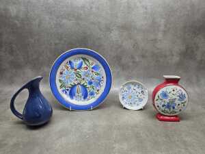 Four ceramic pieces including Lubiana dishes and vase.
