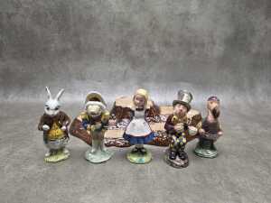 Collection of five Beswick 'Alice in Wonderland' porcelain figures on tree root stand - 2