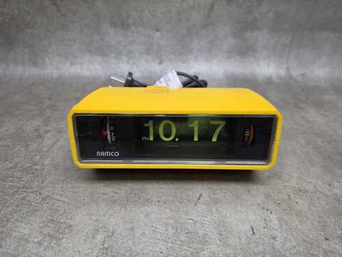 Namco yellow flip clock bedside alarm