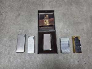 Five cigarette lighters, including Juvena - 2