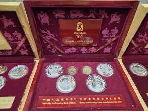 Three Beijing 2008 Olympics gold tone and silver tone souvenir medallion sets - 4