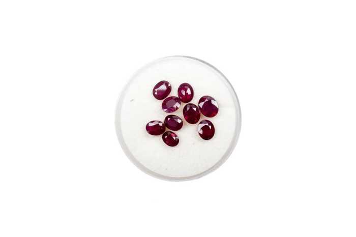 Nine oval natural rubies