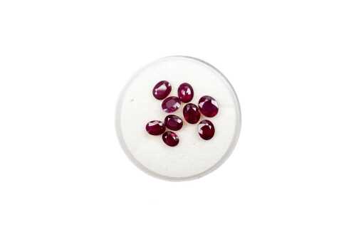Nine oval natural rubies