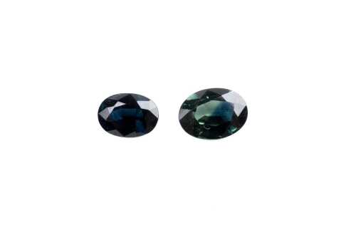 A green and a blue oval sapphire