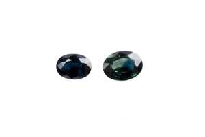A green and a blue oval sapphire