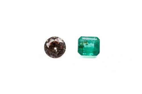 A round morganite and emerald cut emerald
