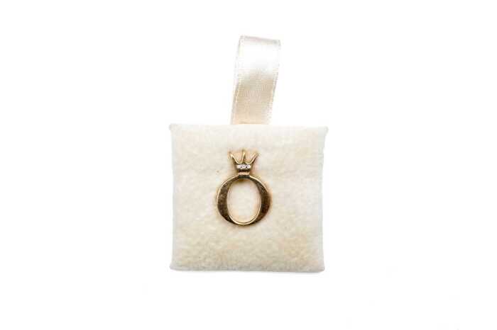A Pandora diamond staff pin in 9 carat yellow gold