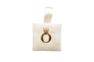 A Pandora diamond staff pin in 9 carat yellow gold