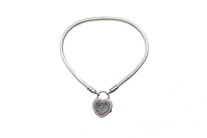 A retired model Pandora "lock your promise" bracelet in sterling silver