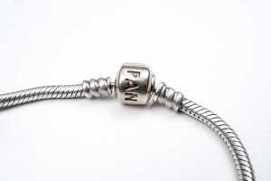 A Pandora bracelet with rare retired Winniper charm in sterling silver. - 3