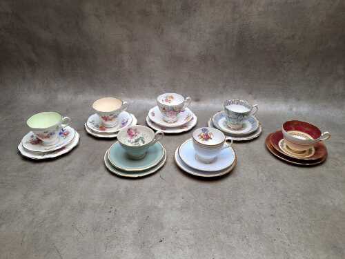 Seven porcelain trios, including Royal Albert