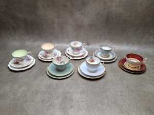 Seven porcelain trios, including Royal Albert