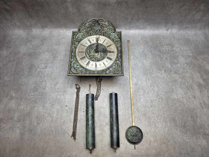 Ornate pendulum wall clock