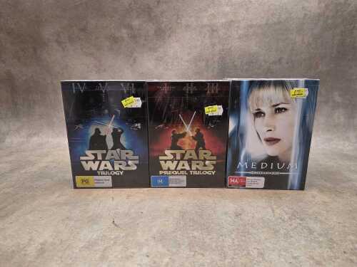 Two Star Wars DVD box sets and Medium box set