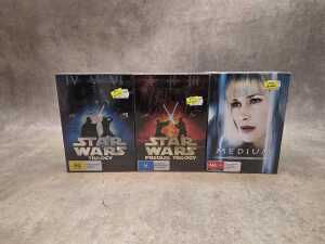 Two Star Wars DVD box sets and Medium box set