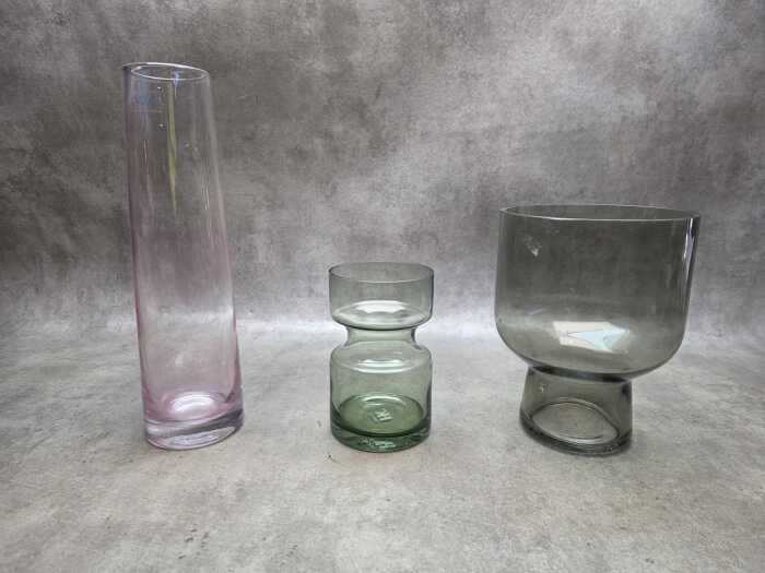 Three decorative art glass vases in various shapes