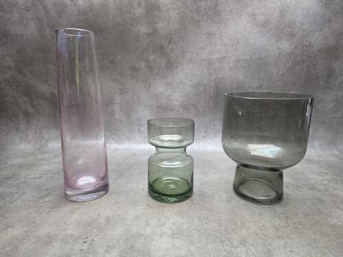 Three decorative art glass vases in various shapes