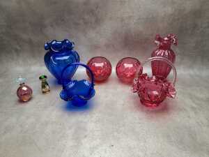 Cranberry and cobalt coloured glassware, including Fenton