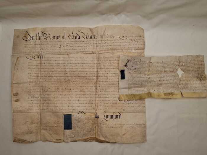Two eighteenth-century legal documents handwritten on vellum
