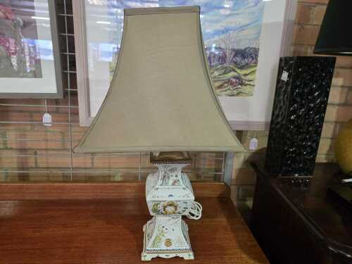 Oriental table lamp with porcelain base and gilt features.