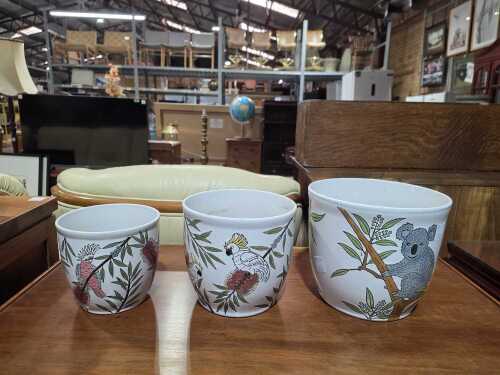 Three ceramic planter pots