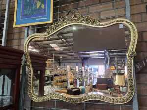 Ornate gold wall mirror