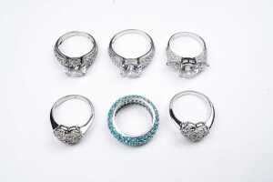 Six cubic zirconia rings in sterling silver