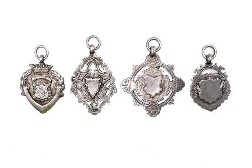 Four shields in sterling silver