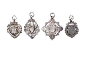 Four shields in sterling silver