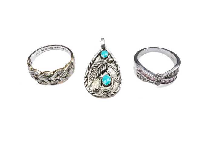 Two silver rings and one pendant in sterling silver