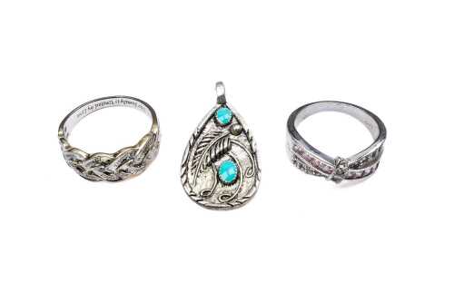 Two silver rings and one pendant in sterling silver