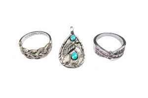 Two silver rings and one pendant in sterling silver