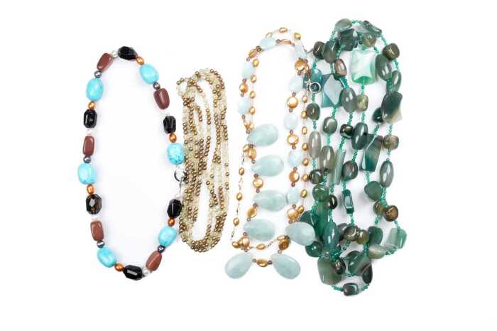 Four gemstone and glass necklaces