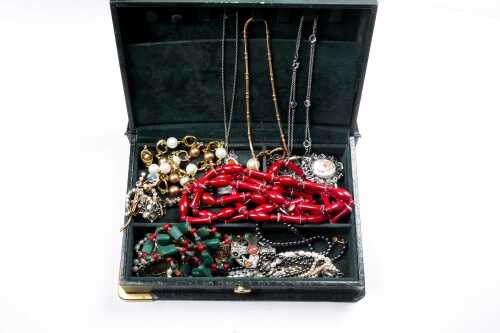 Collection of costume jewellery in box
