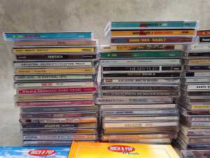 CDs, mostly Country and Rock n Roll, including George Strait - 2