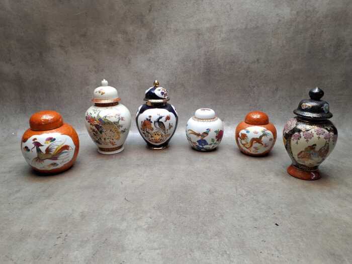 Six Oriental porcelain lidded ginger jars