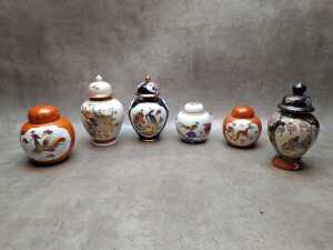 Six Oriental porcelain lidded ginger jars