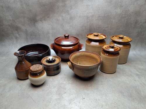 Stoneware storage jars, lidded casserole dish and servingware, some Bendigo Pottery