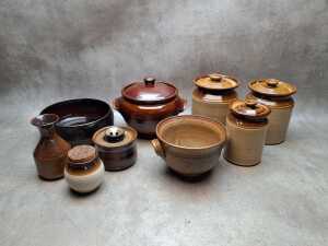Stoneware storage jars, lidded casserole dish and servingware, some Bendigo Pottery