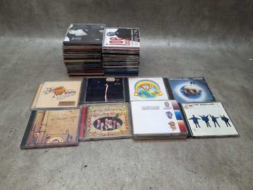 30 Rock and Pop CDs, including Led Zeppelin, The Beatles, The Rolling Stones