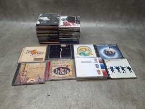 30 Rock and Pop CDs, including Led Zeppelin, The Beatles, The Rolling Stones