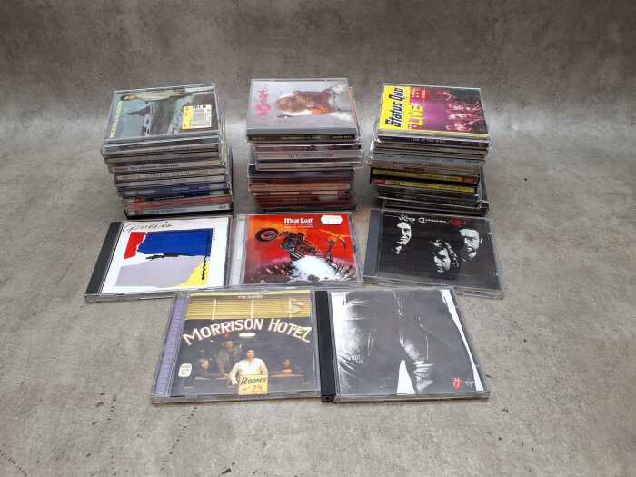 35 Rock and Pop CDs, including Genesis, David Bowie, Dire Straits