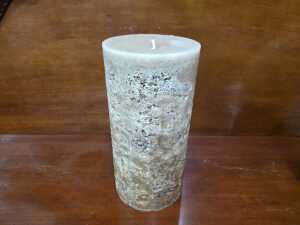Two textured decorative candles, including pillar and egg shapes. - 2