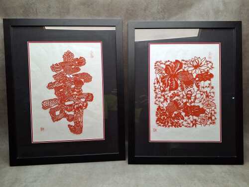 Pair of Chinese papercut pictures including goldfish and Chinese character