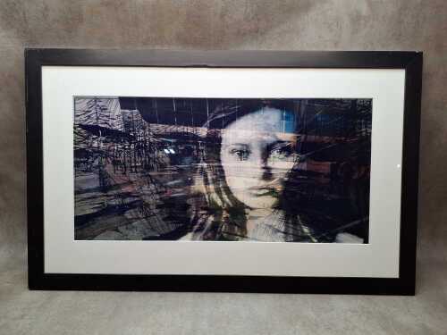 Photographic montage of woman's face with architectural background